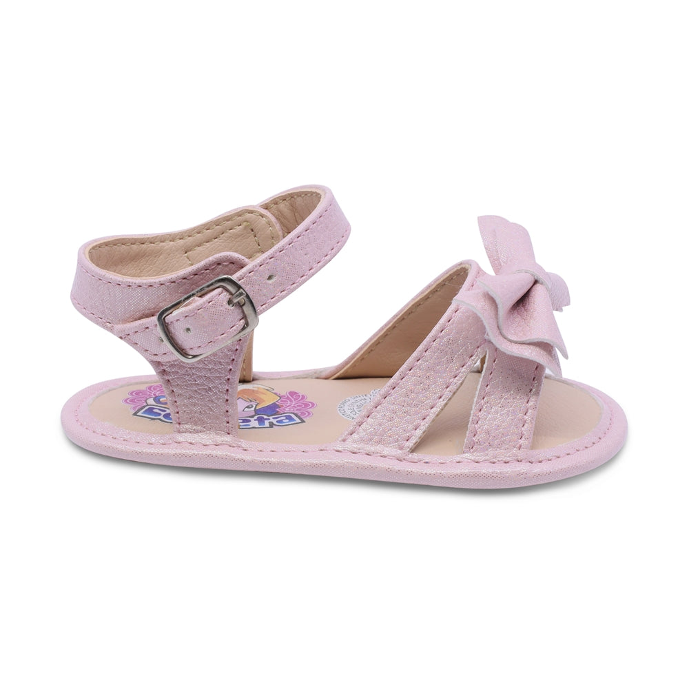 Sandalia Coqueta para niña en sintético rosa Eredi con detalle de moño.