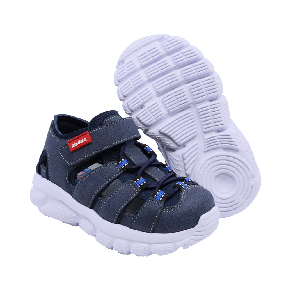 Sandalias Audaz para niño en sintético azul waffle con tira de contacto
