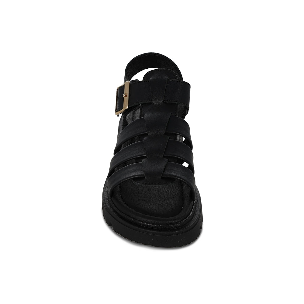 Sandalia Coqueta para niña en piel negra Tomasa con hebilla.