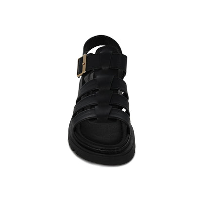 Sandalia Coqueta para niña en piel negra Tomasa con hebilla.