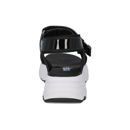 Sandalia Coqueta para niña en charol negro Salim con tira de contacto