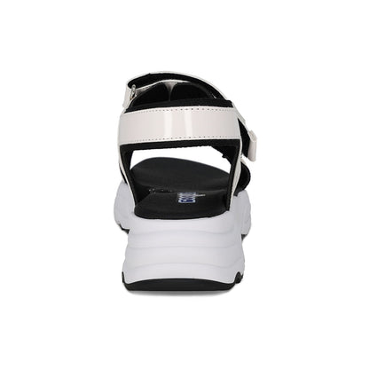 Sandalia Coqueta para niña en charol blanco Salim con tira de contacto