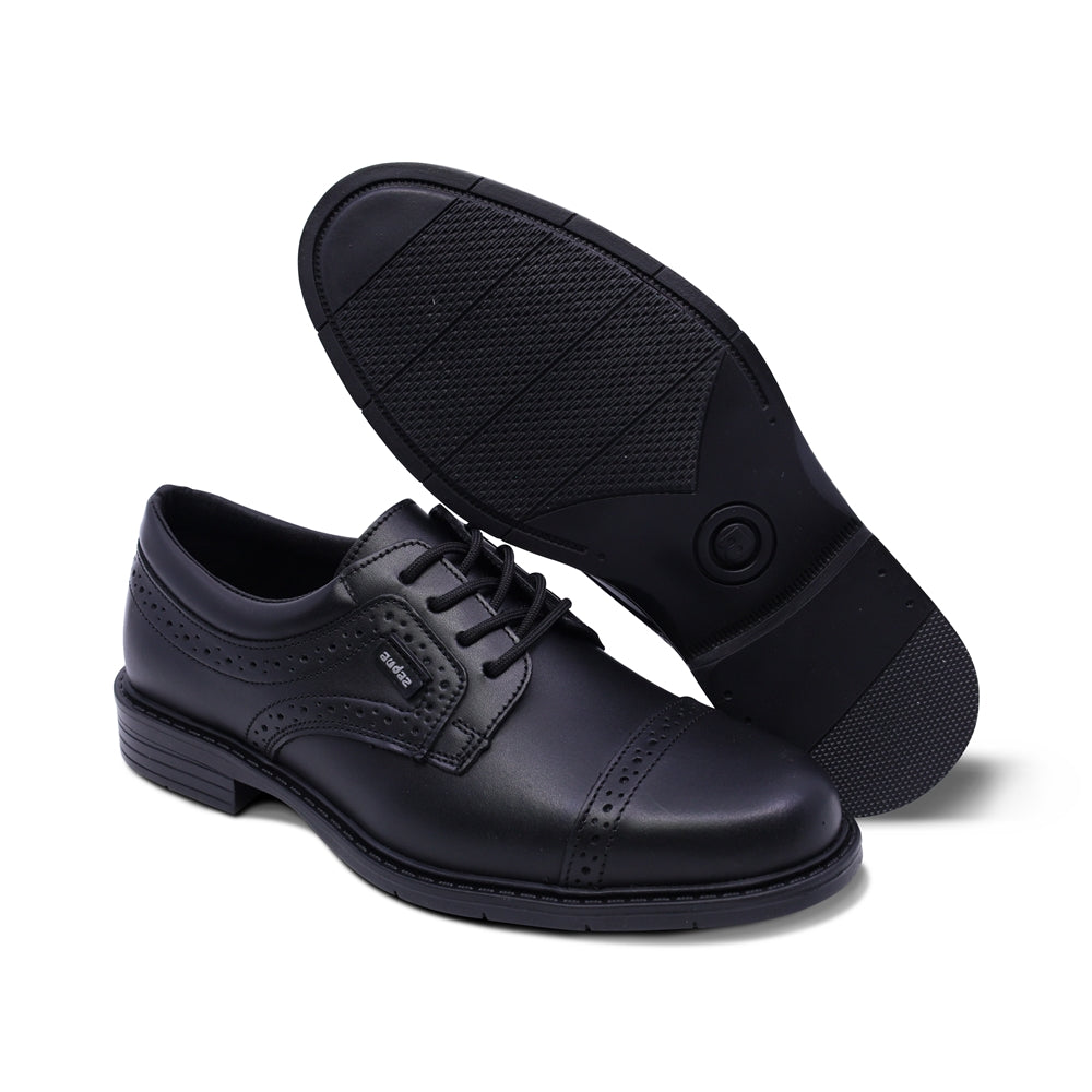 Zapato escolar Audaz para niño de piel negro Adams con diseño perforado