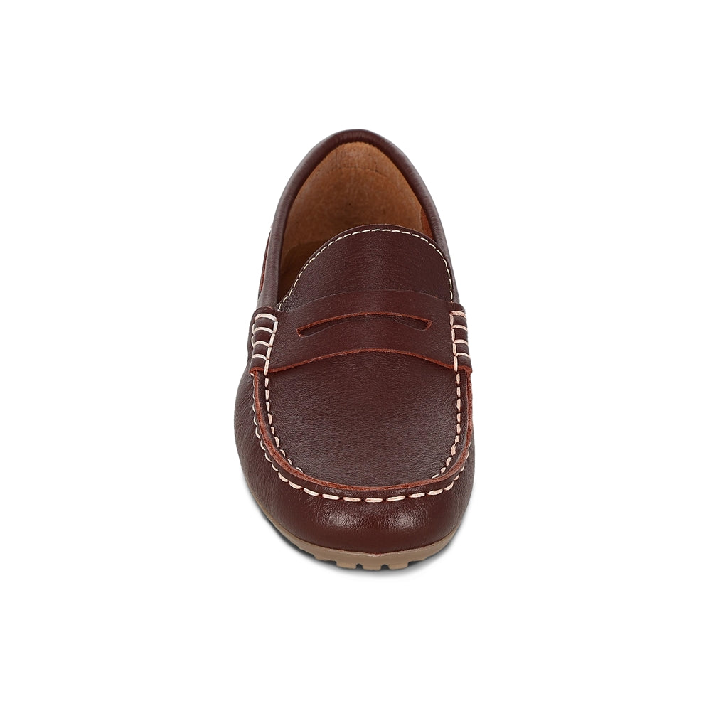 Mocasín Audaz para niño en piel  ladrillo Malaga con suela resistente.