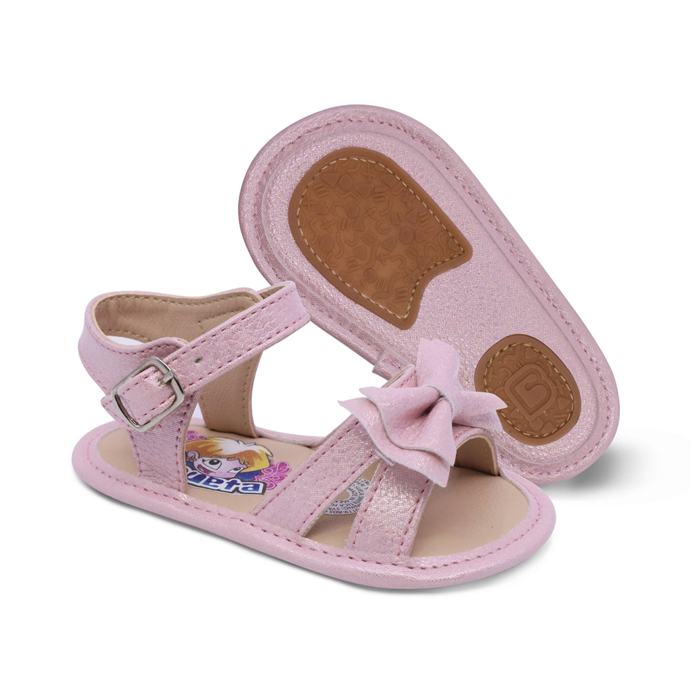 Sandalia Coqueta para niña en sintético rosa Eredi con detalle de moño.