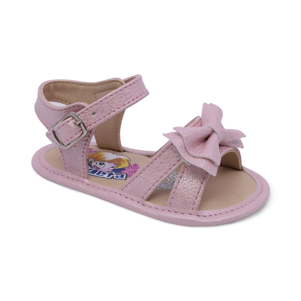 Sandalia Coqueta para niña en sintético rosa Eredi con detalle de moño.